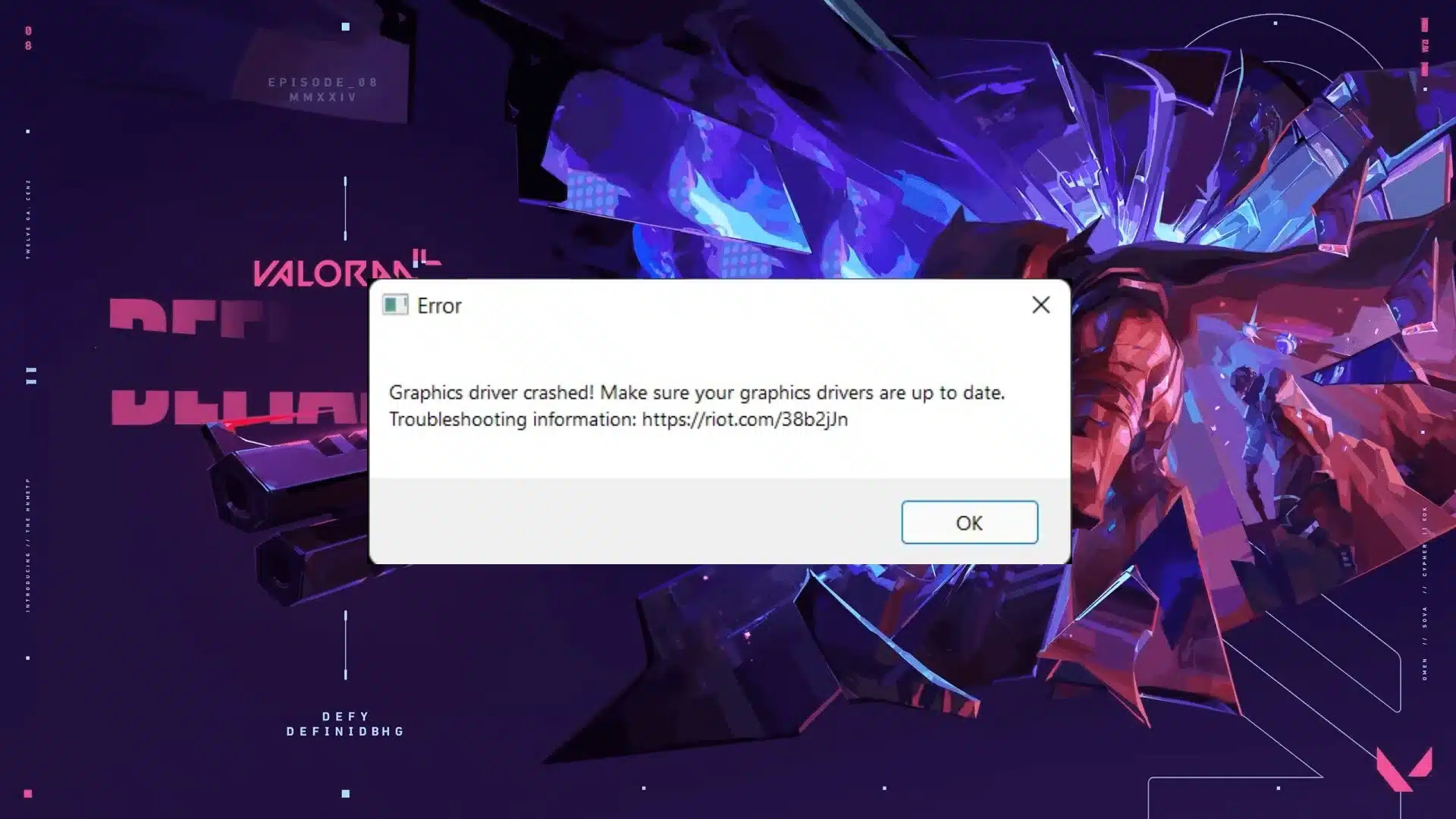 A Windows error popup message overlaying a Valorant loading screen stating that the graphics driver crashed and to make sure graphics drivers are up to date with a troubleshooting link.