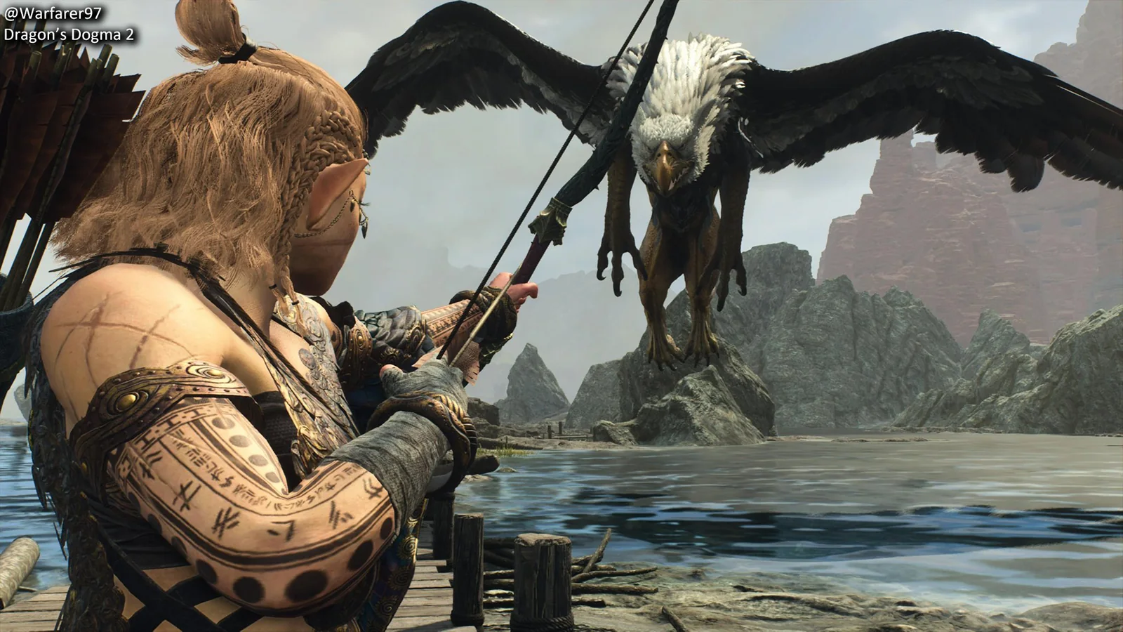 Official Dragon’s Dogma 2 screenshot showing the Dragon in close-up with wings spread against a smoky battlefield