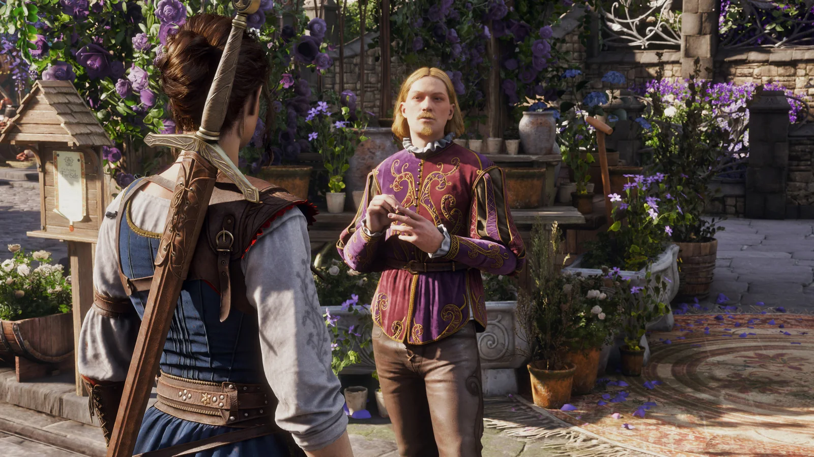Official Fable screenshot showing the Hero speaking with an NPC in a colorful flower-filled settlement