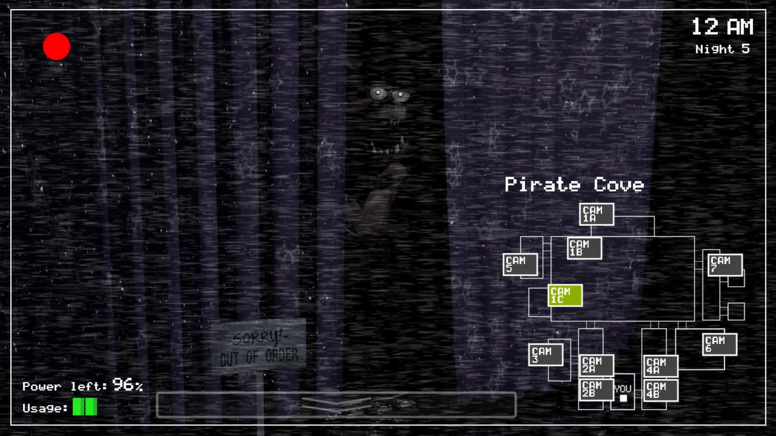 Official Five Nights at Freddy's gameplay screenshot showing Foxy behind the Pirate Cove curtain