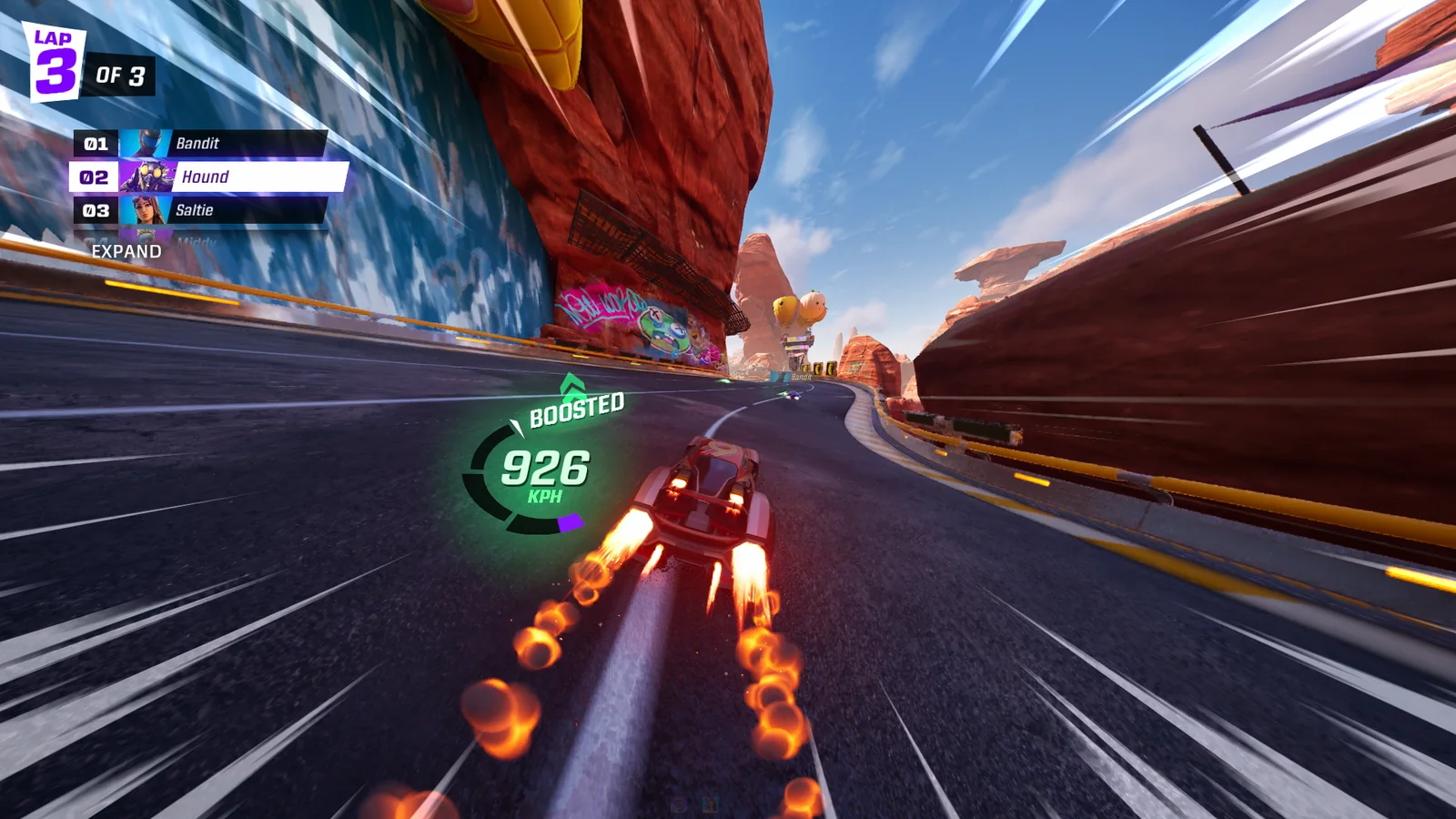 Official Rocket Racing gameplay screenshot showing a car boosting at high speed through the canyon course