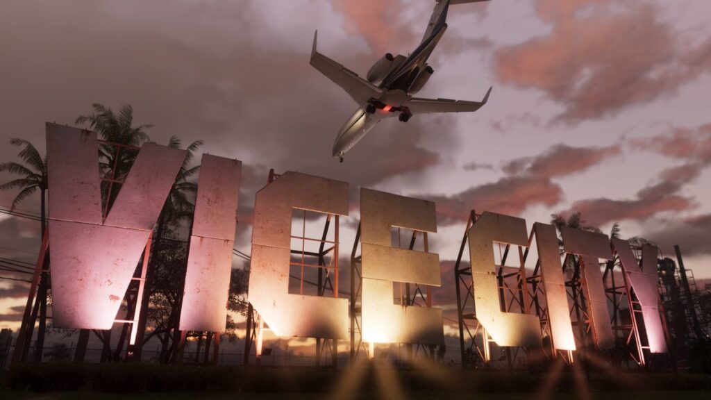 GTA VI Spotify Billboards Appear Across Major US Cities Official GTA VI screenshot showing the illuminated Vice City sign with an airliner passing overhead at sunset