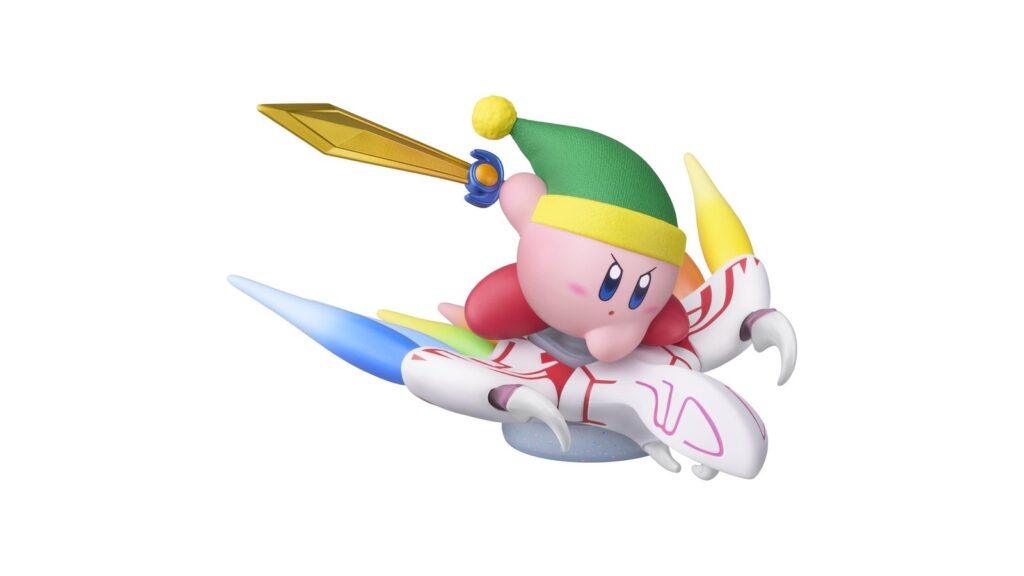 Kirby Air Riders Sword Kirby and Noir Dedede amiibo Dated Official Sword Kirby & Dragoon amiibo product image showing Sword Kirby mounted on the Dragoon Air Ride Machine