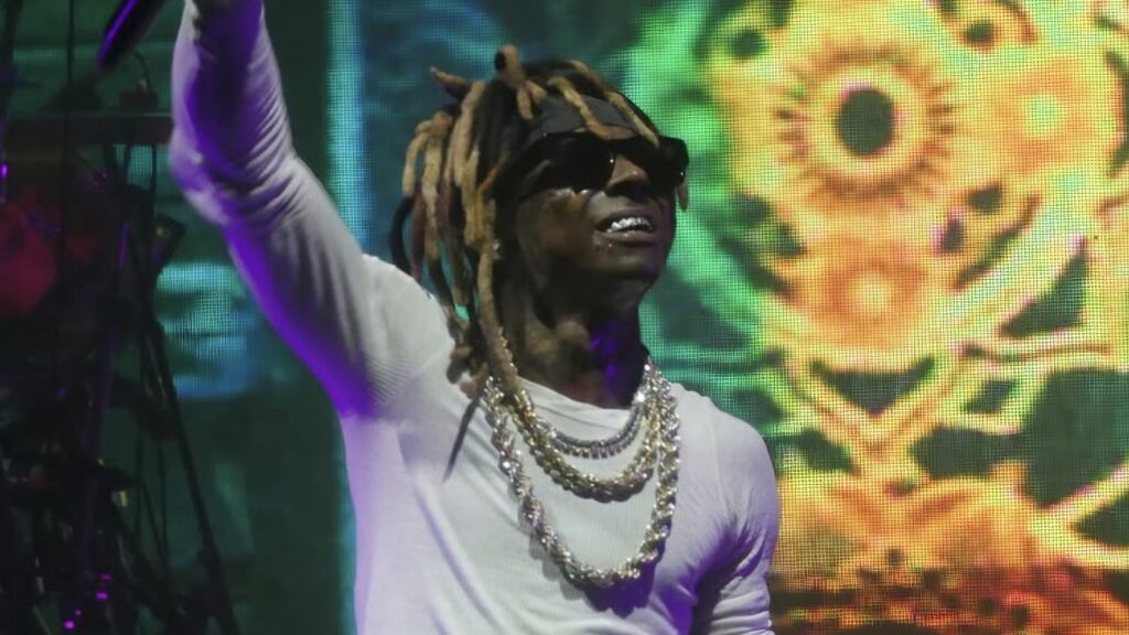 Lil Wayne Posts New Fortnite Teaser as Collaboration Signs Grow Lil Wayne portrait accompanying coverage of his Fortnite-themed Instagram Story