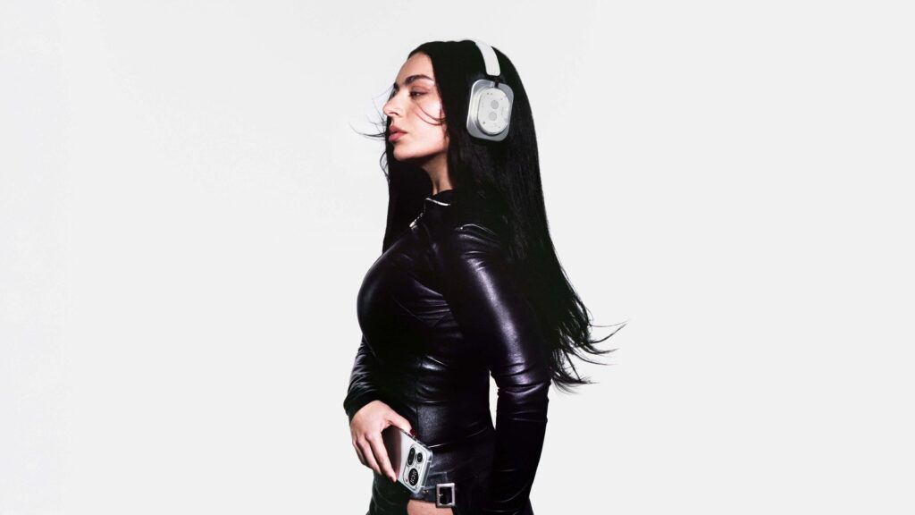 Official Nothing Headphone (1) product render in white, shown at a three-quarter angle with its transparent earcup