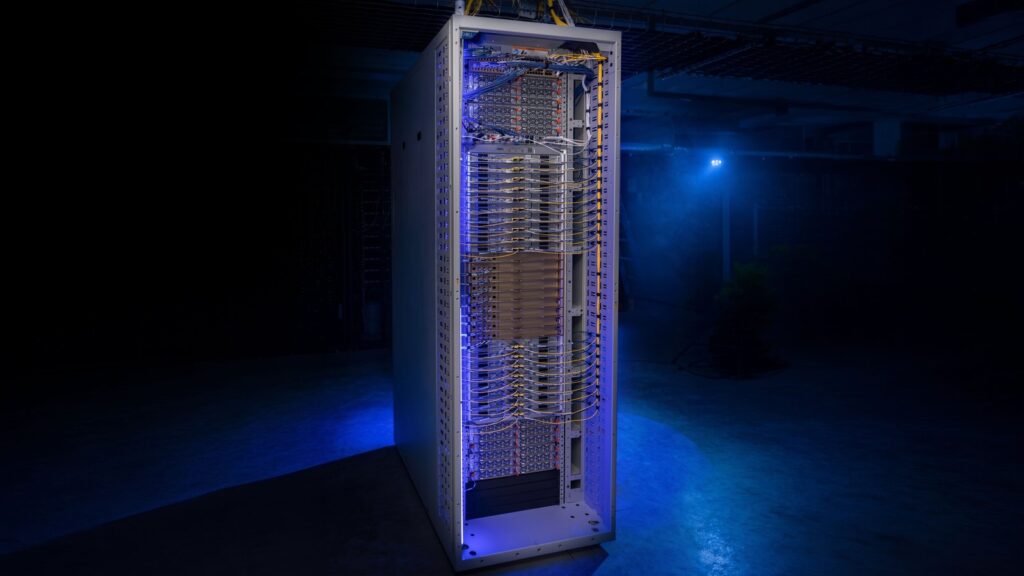 Vera Rubin NVL72 rack photographed in a data-center environment with blue lighting