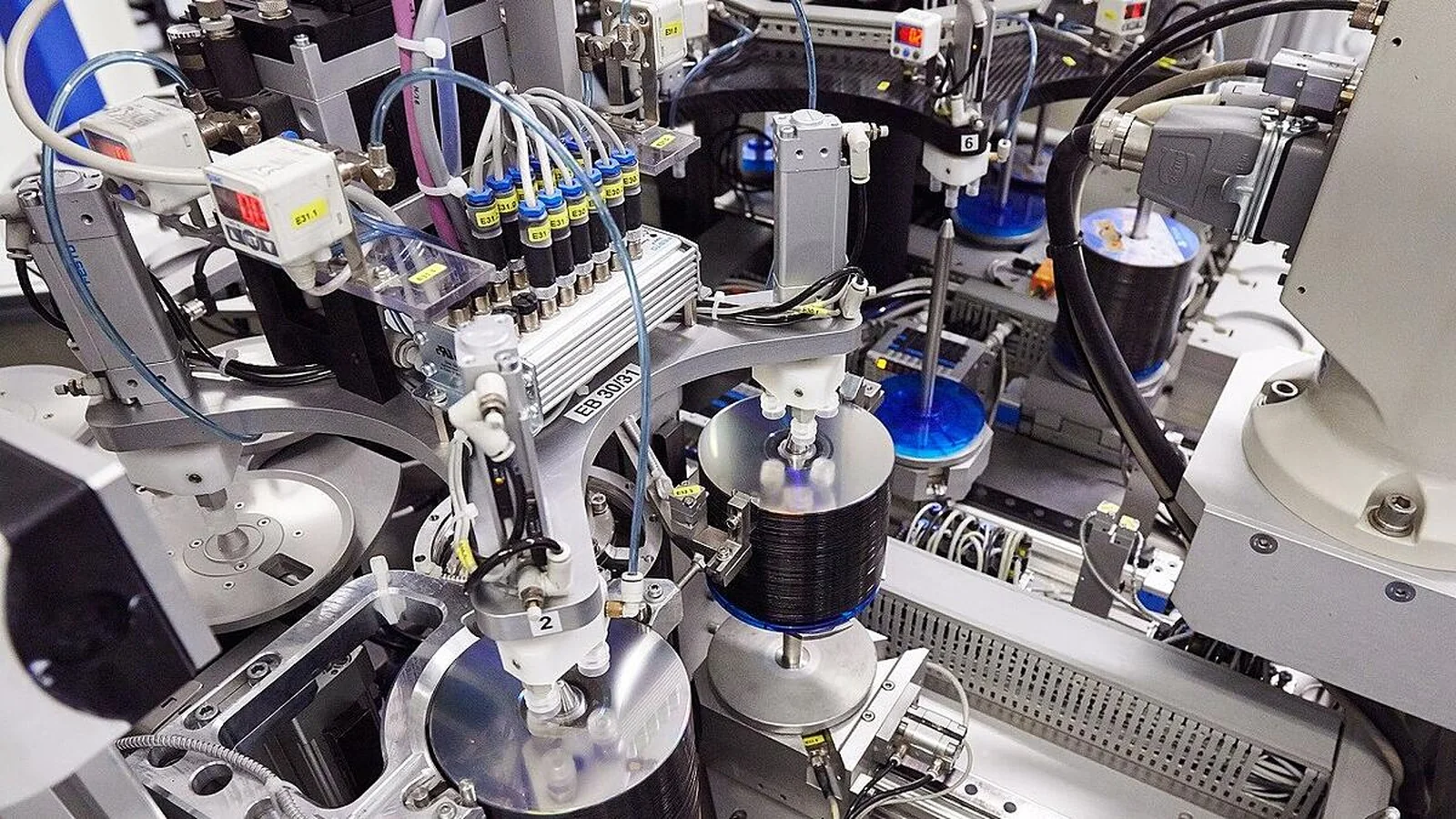 Sony DADC optical disc production line at the Thalgau facility, showing automated machinery handling stacks of physical