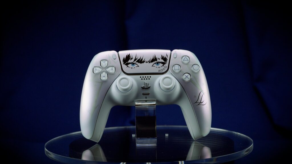 PlayStation Reveals Lisa Limited Edition DualSense Controller Official front-facing product photo of the Lisa Limited Edition DualSense controller on a dark blue background