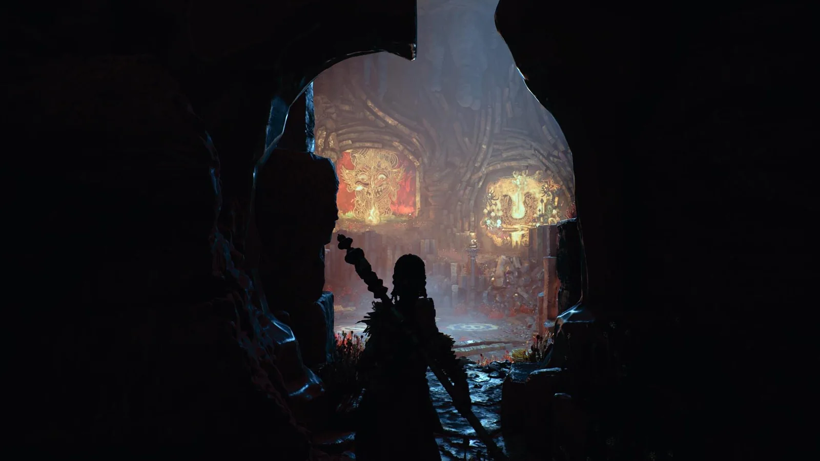 Official gameplay screenshot showing Raji silhouetted at the entrance to a richly decorated temple environment