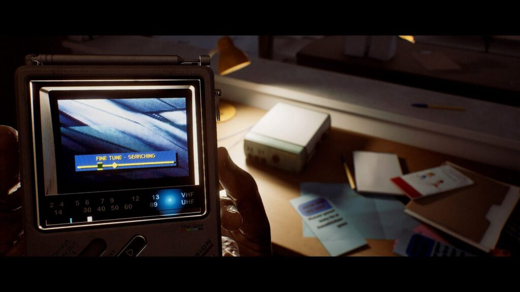 Silent Hill: Townfall Details First-Person Combat, Stealth and CRTV Official first-person Silent Hill: Townfall screenshot showing Simon holding the CRTV while searching an interior