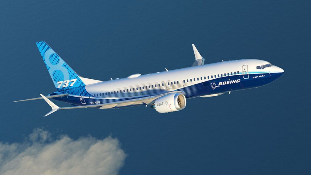 Southwest and United Reject New 737 MAX Software Version Boeing 737-8 MAX flying above clouds