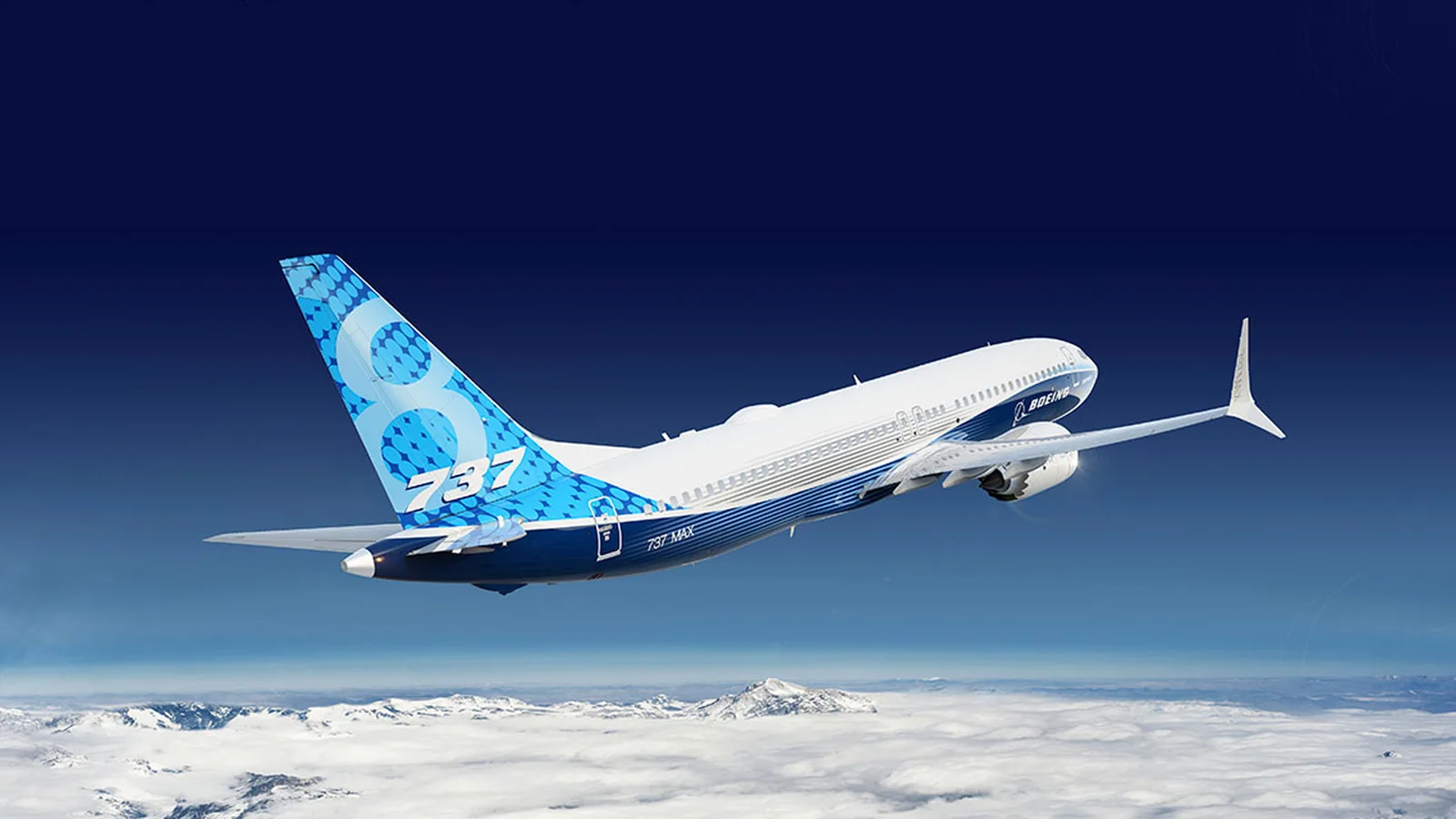 Boeing 737 MAX aircraft shown from a rear three-quarter angle above clouds