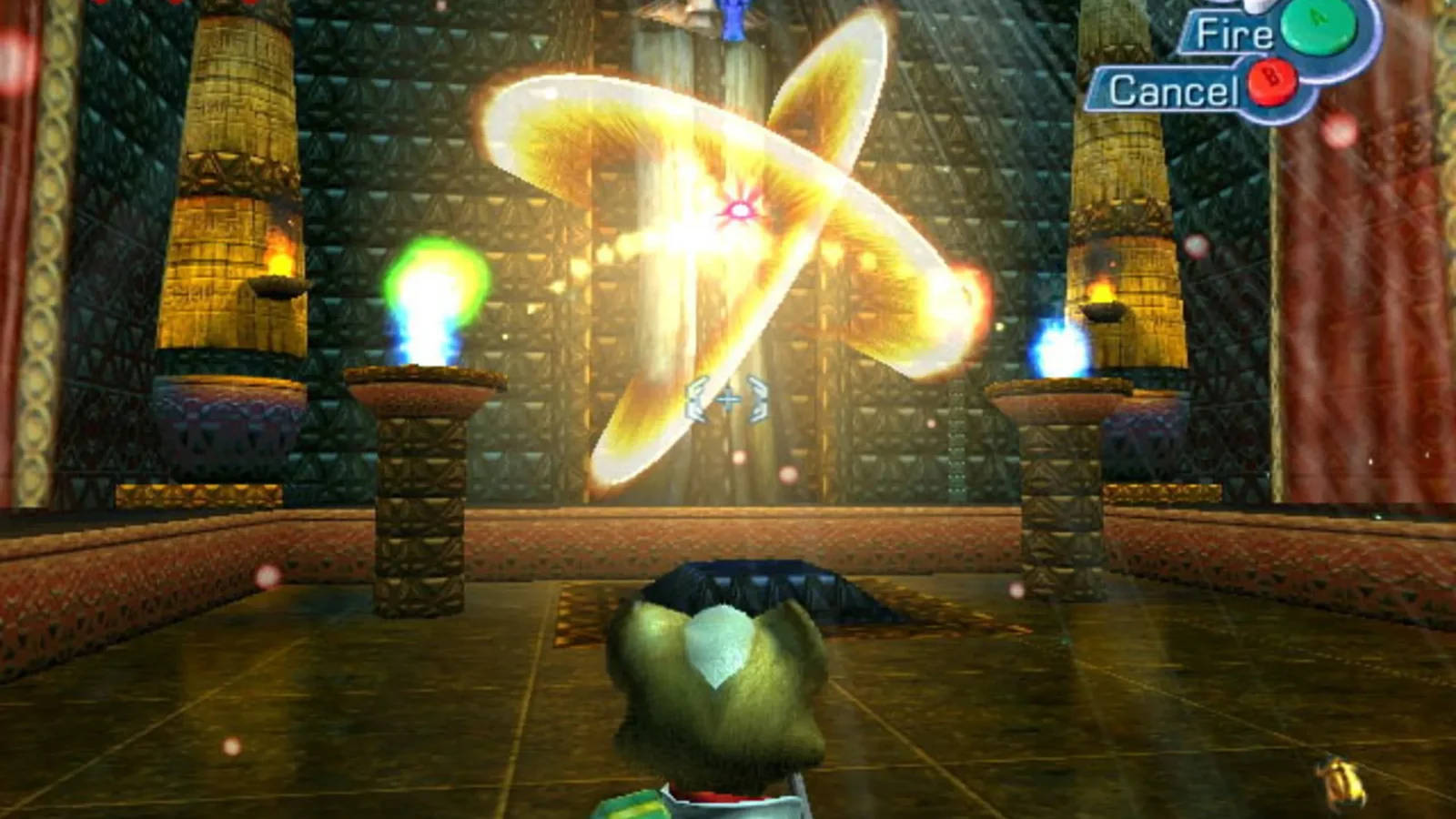 Star Fox Adventures screenshot showing Fox using a glowing fire spell inside an ancient chamber