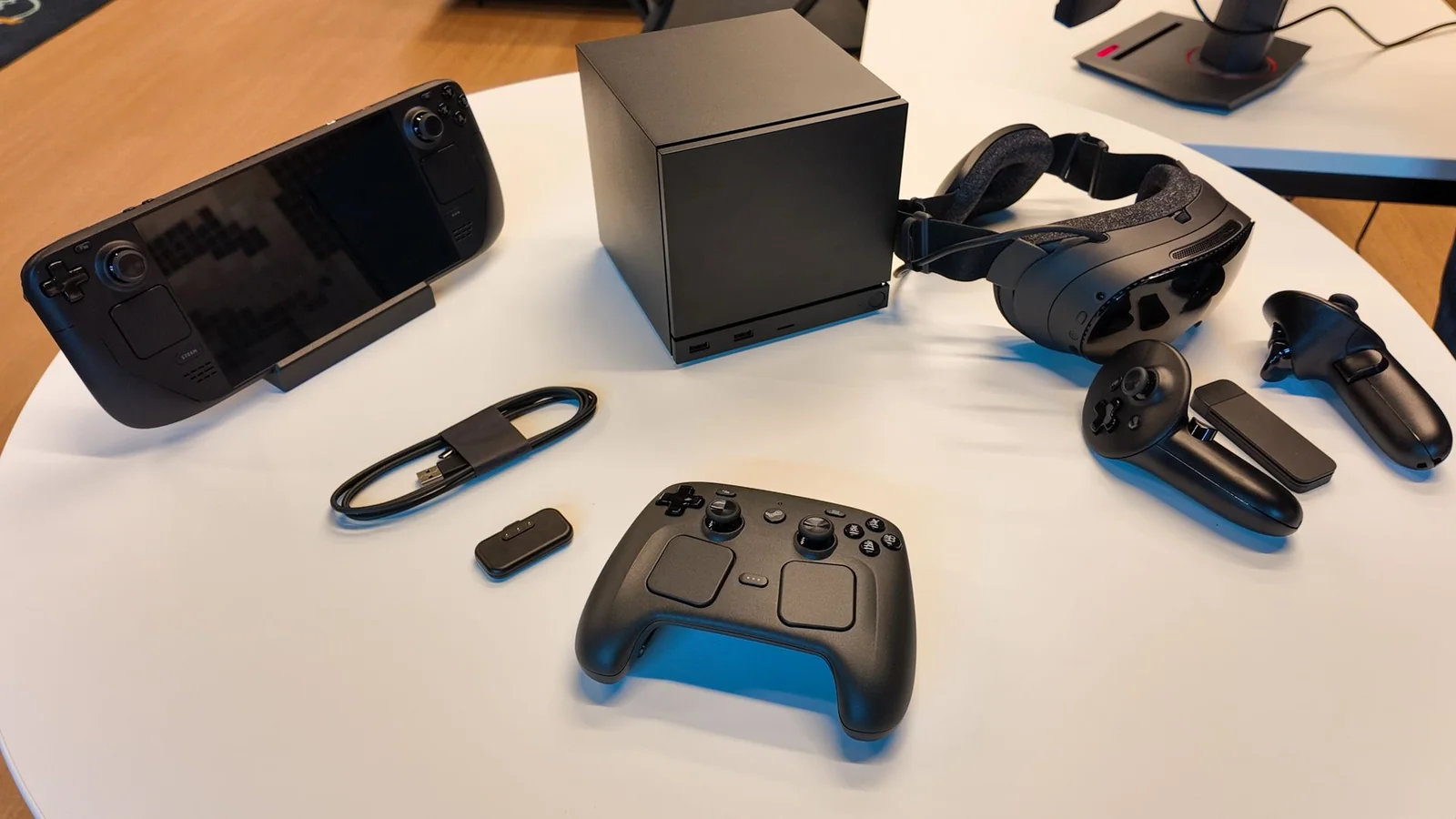 Steam Frame controllers held together during a Valve hands-on session