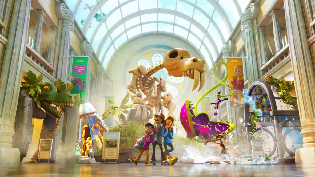 Official Two Point Museum gameplay image showing a museum exterior area with paths, landscaping and interactive exhibits