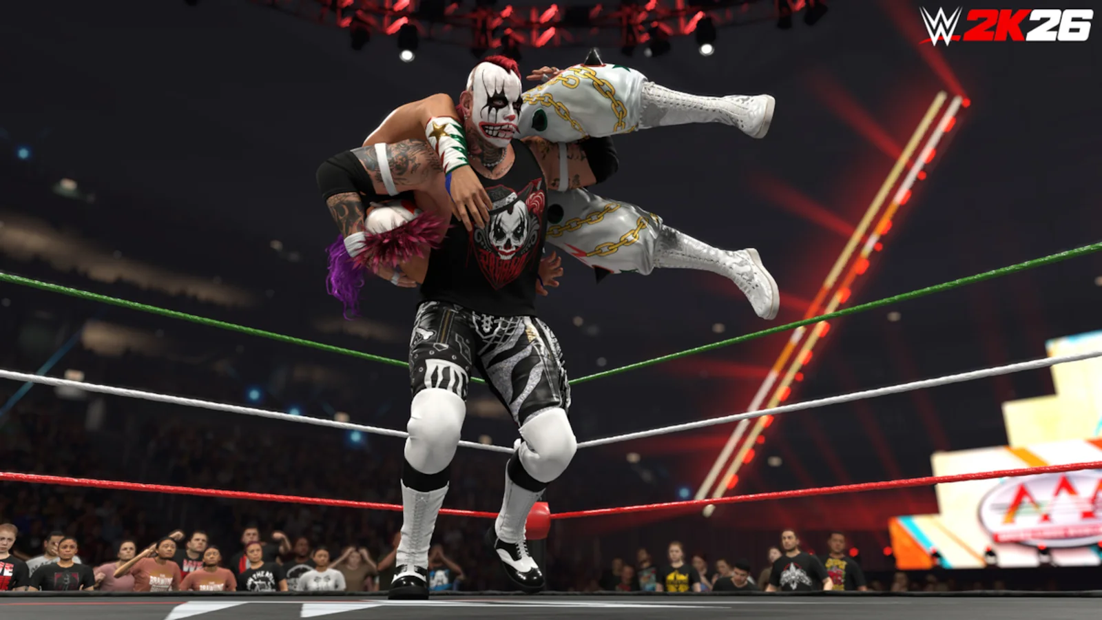 Official WWE 2K26 Season 5 gameplay screenshot showing Pagano carrying an opponent in the ring