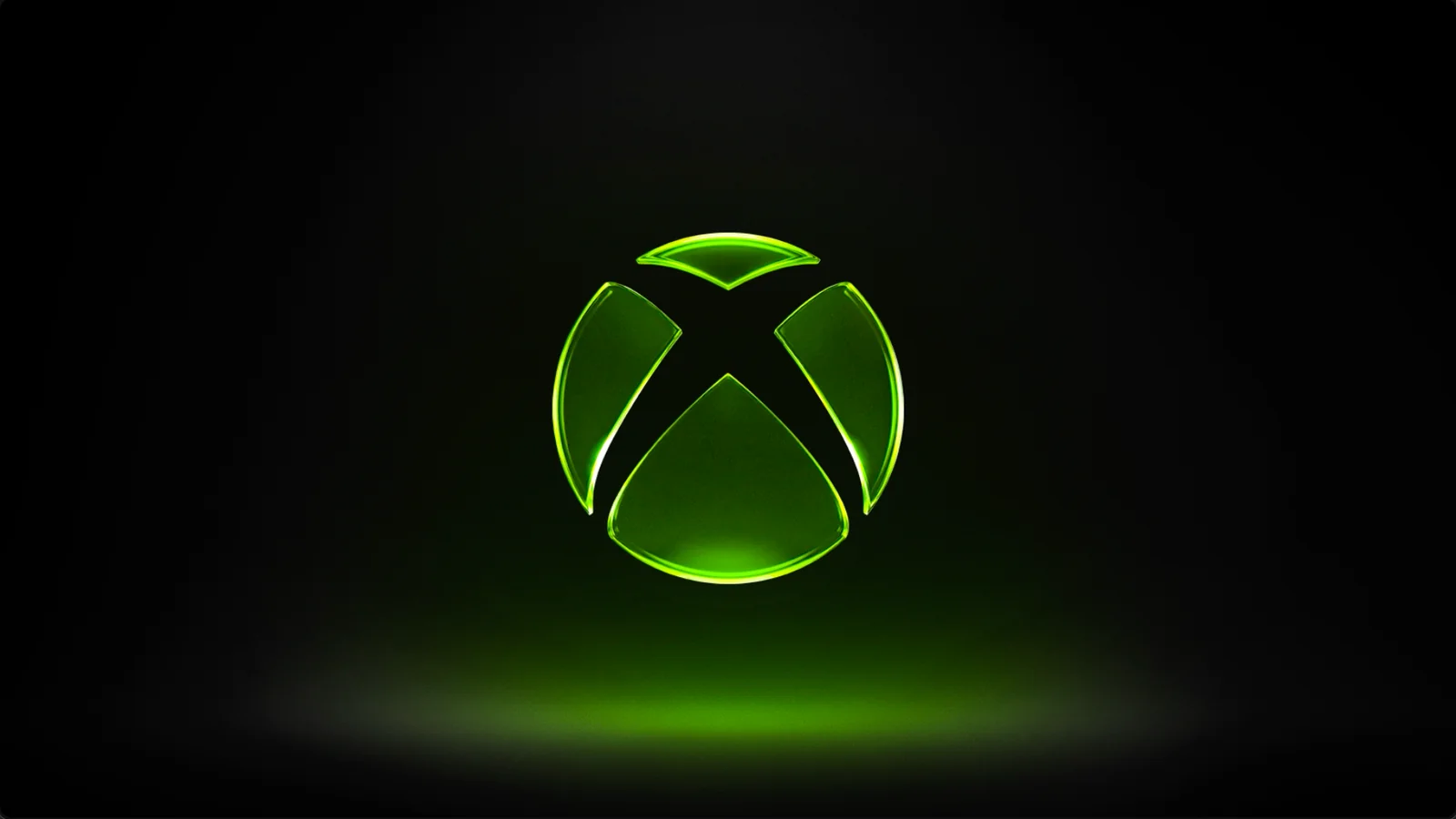 Official Xbox logo glowing green against a dark background
