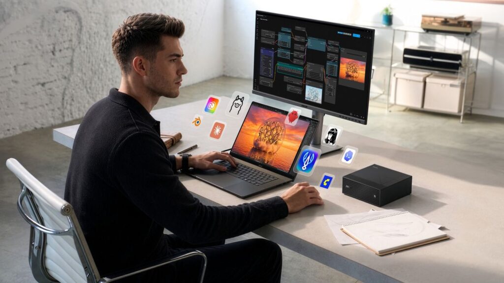 ASUS Launches ProArt P16, P14 and GR1X With NVIDIA RTX Spark Official ASUS lifestyle image showing a ProArt laptop in use beside the compact ProArt GR1X mini PC and an external