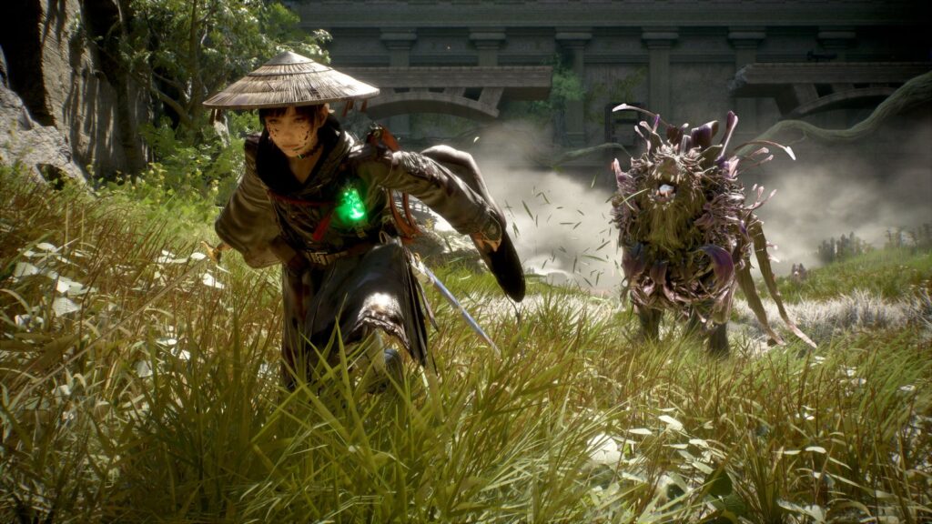 Beast of Reincarnation Update 1.1.02 Adds New Game+ Changes Emma runs through sunlit grass with her sword drawn as a large plant-covered creature attacks behind her