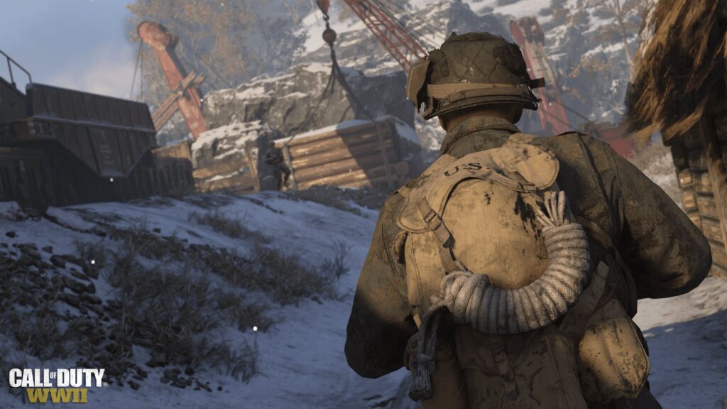 Call of Duty: WWII Is Free on PlayStation Store in Some Regions Official Call of Duty: WWII promotional image showing a squad of American soldiers advancing through a battlefield