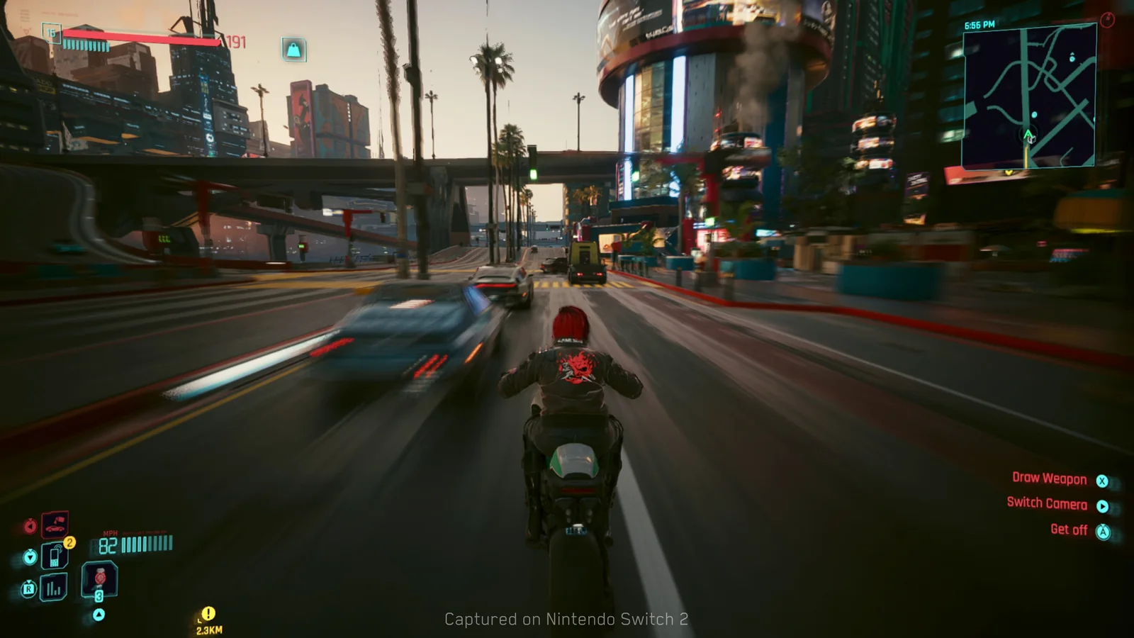 Cyberpunk 2077 motorcycle rider speeding through a busy Night City boulevard