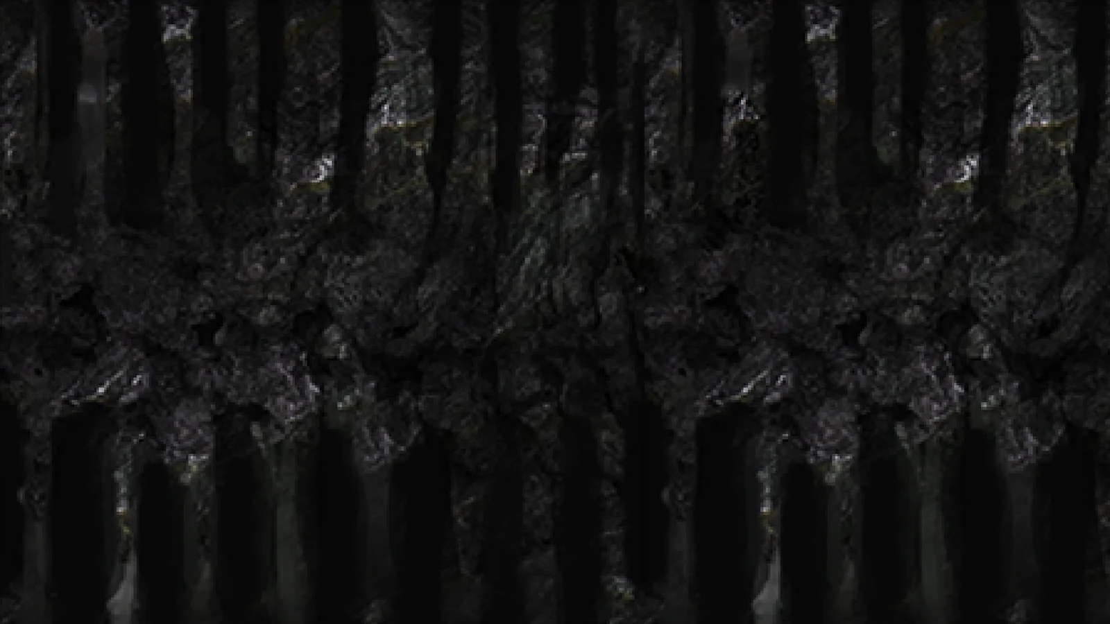 Grotesque alien creature shown in a dark, monochrome cinematic shot from the official DERELIKT release-date reveal