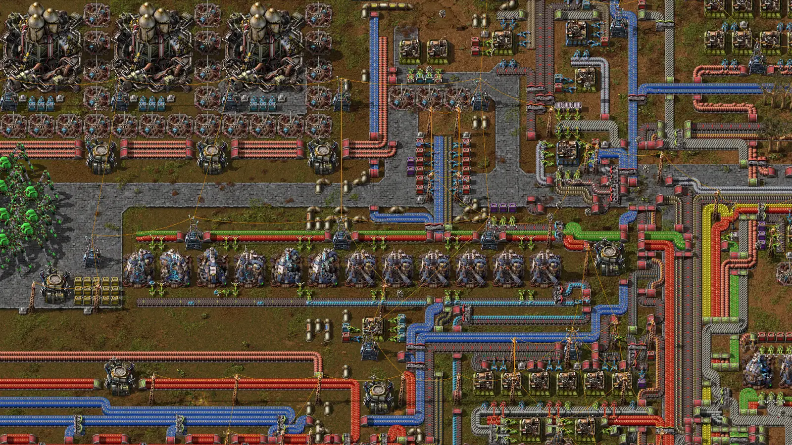 Factorio: Space Age factory featuring advanced production equipment, red and blue conveyor belts, robotic inserters and