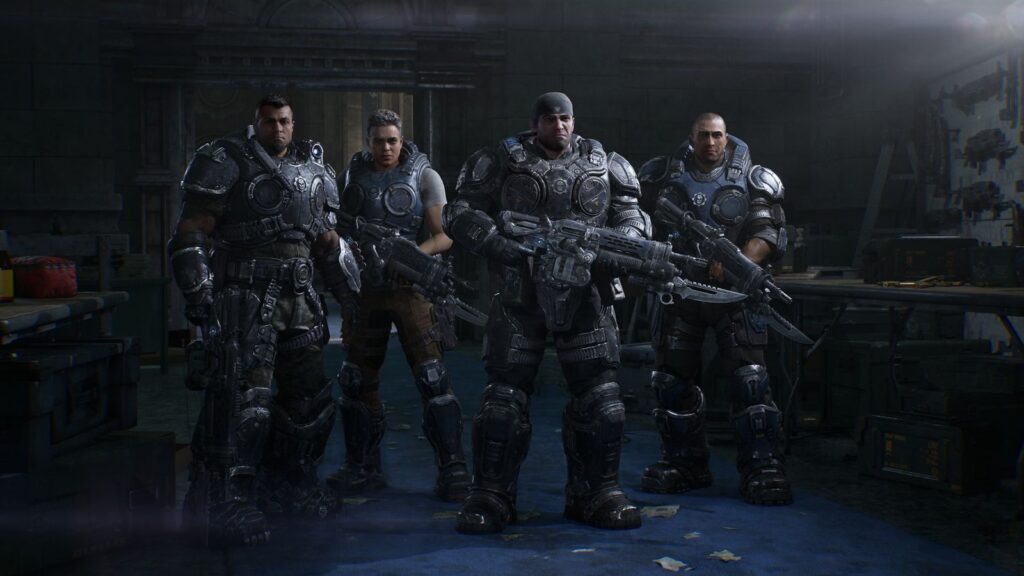 The Coalition Says Next Gears Game Won’t Take as Long Official Gears of War: E-Day image showing Bravo Squad, including Marcus Fenix and Dom Santiago, standing together in