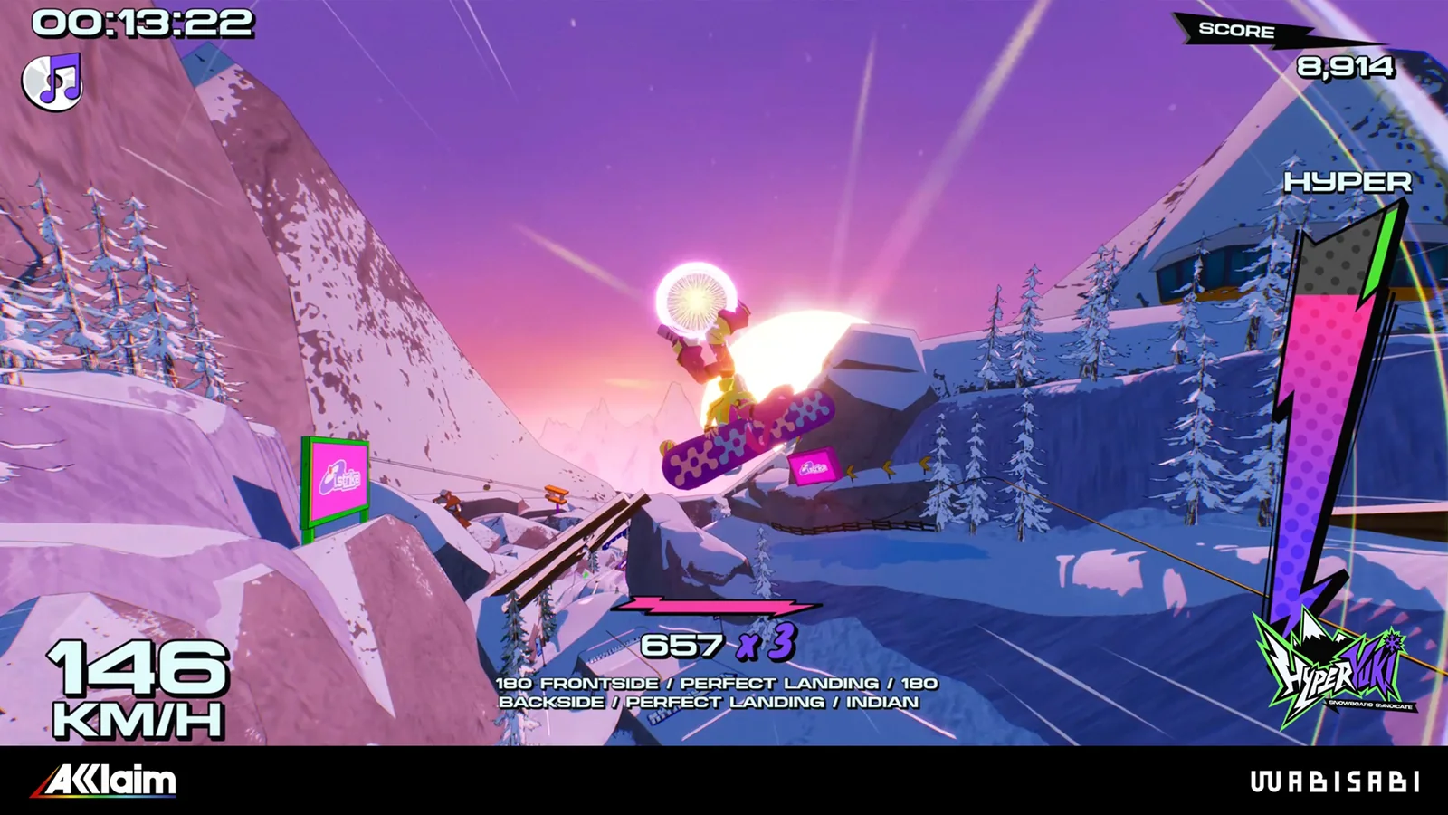Snowboarder performing a trick against a purple sunset over snow-covered mountains