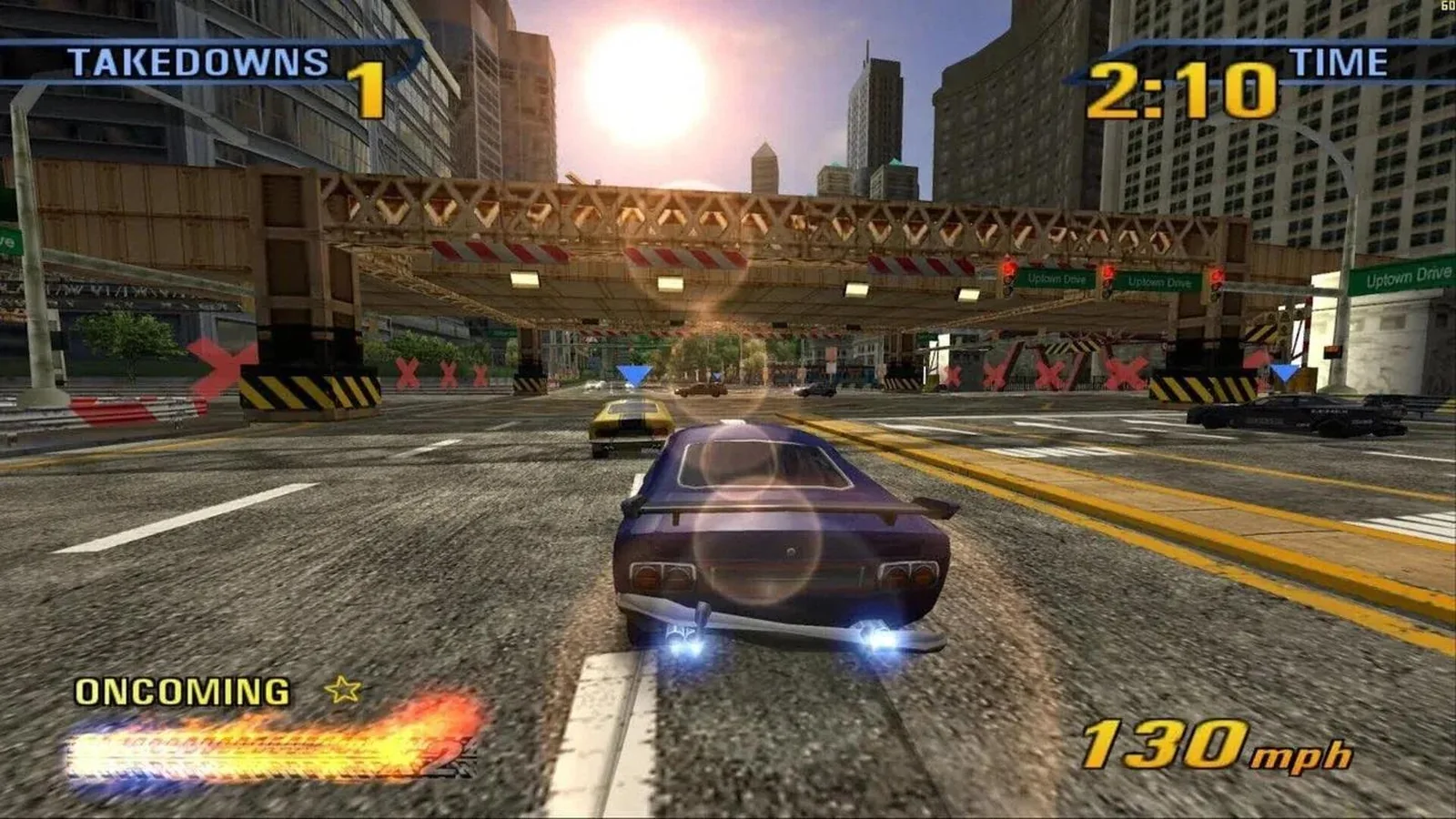 Purple sports car racing through a city intersection beneath an elevated railway, with blue nitrous flames visible