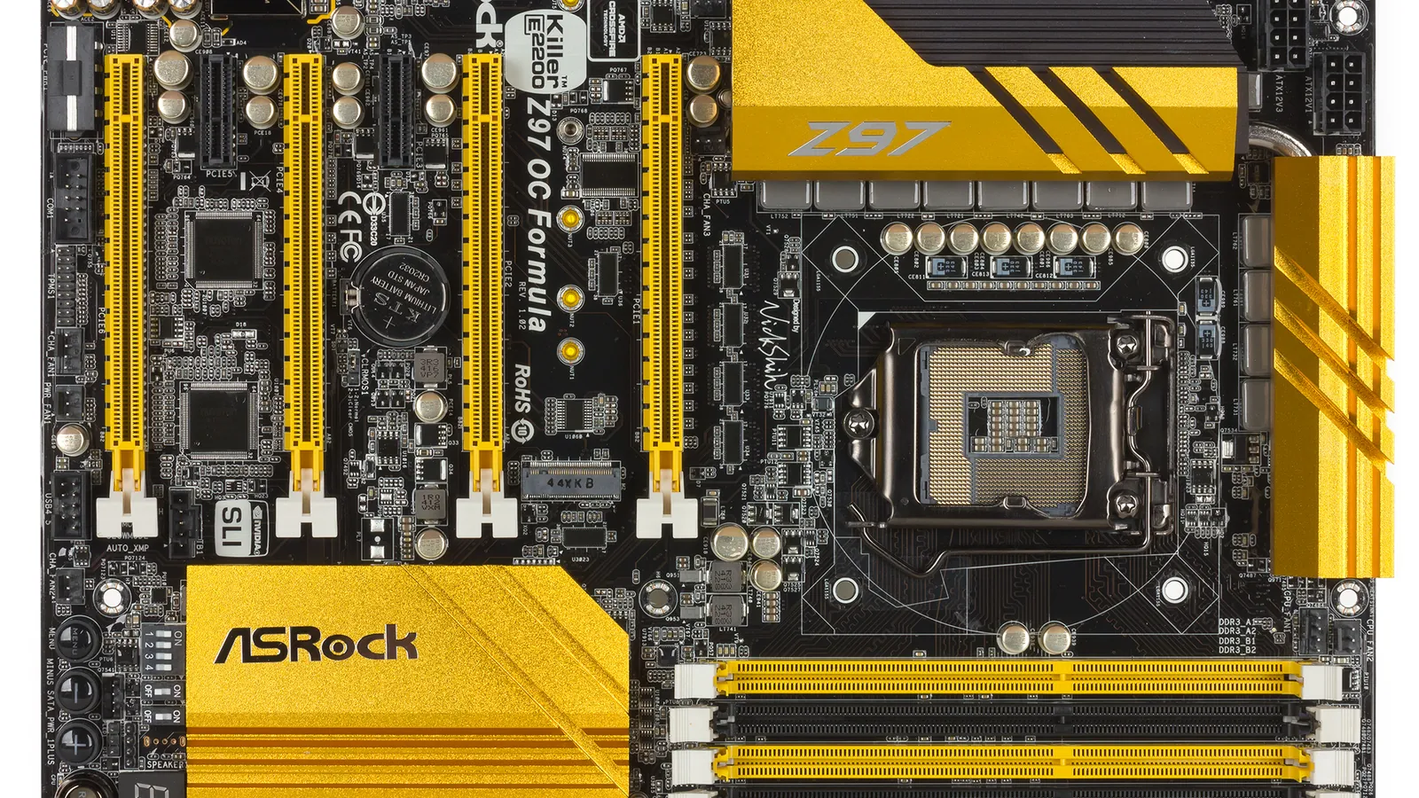 Full overhead photograph of the ASRock Z97 OC Formula motherboard, featuring a black PCB, gold heatsinks, yellow