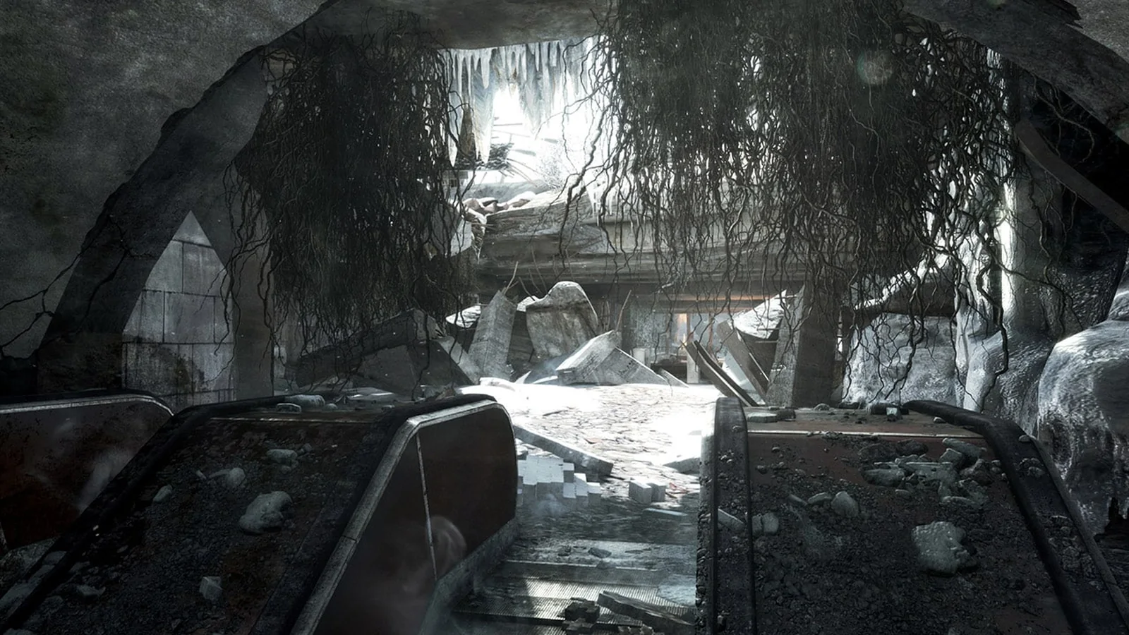 Metro Last Light Redux screenshot showing a ruined station entrance illuminated by daylight, with debris and hanging
