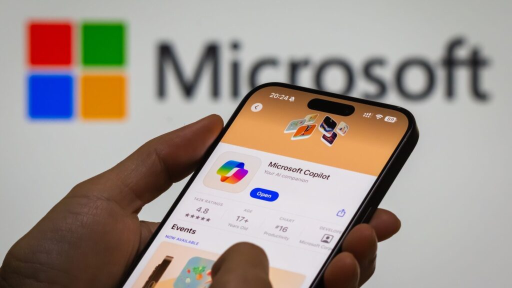 Microsoft Offers Buyouts to 60,000 Employees, Including Xbox Microsoft headquarters building in Redmond, Washington, with Microsoft branding and a pedestrian walking outside