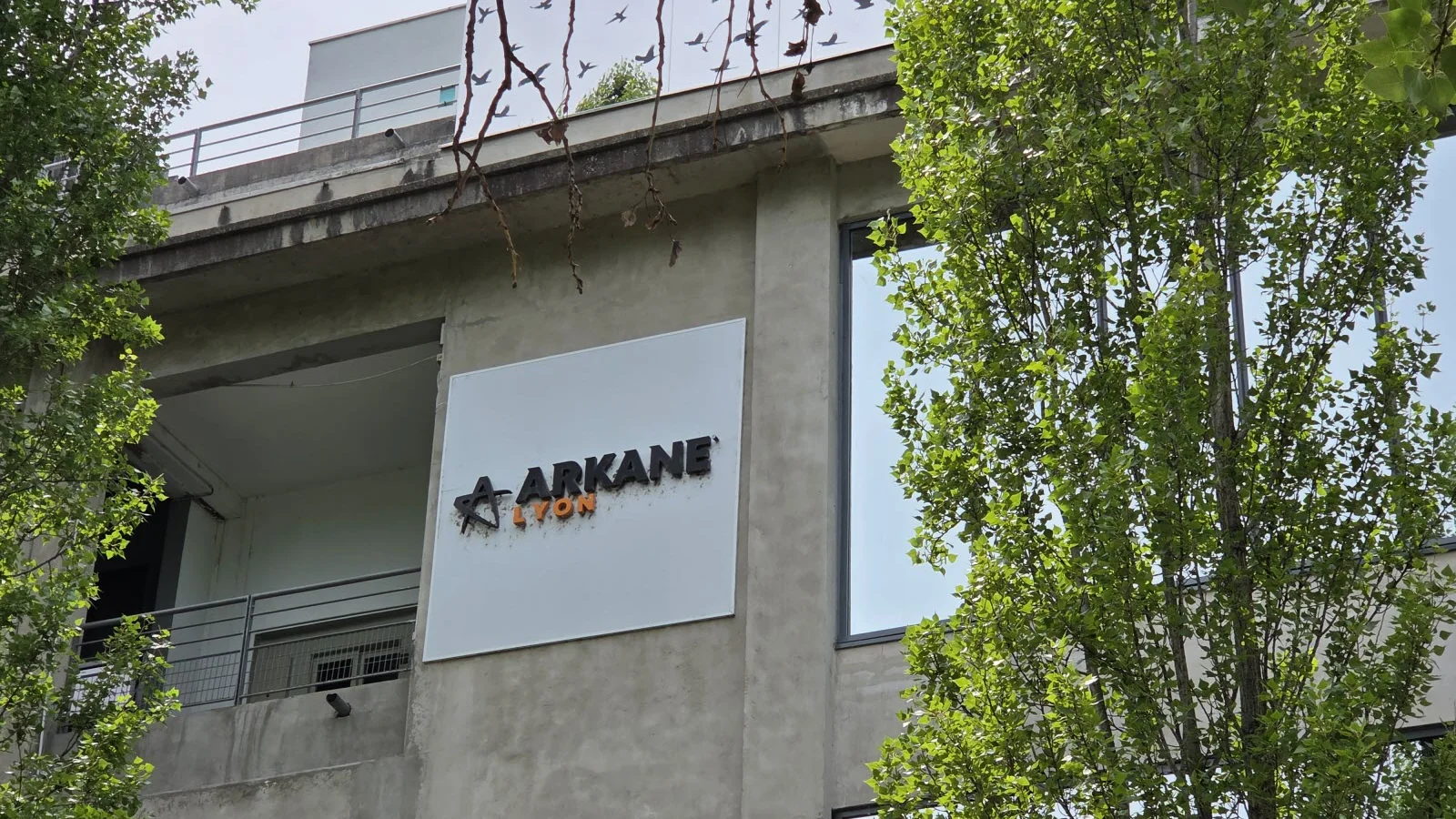Arkane Lyon studio headquarters in France, showing the Arkane Lyon sign on the building's exterior