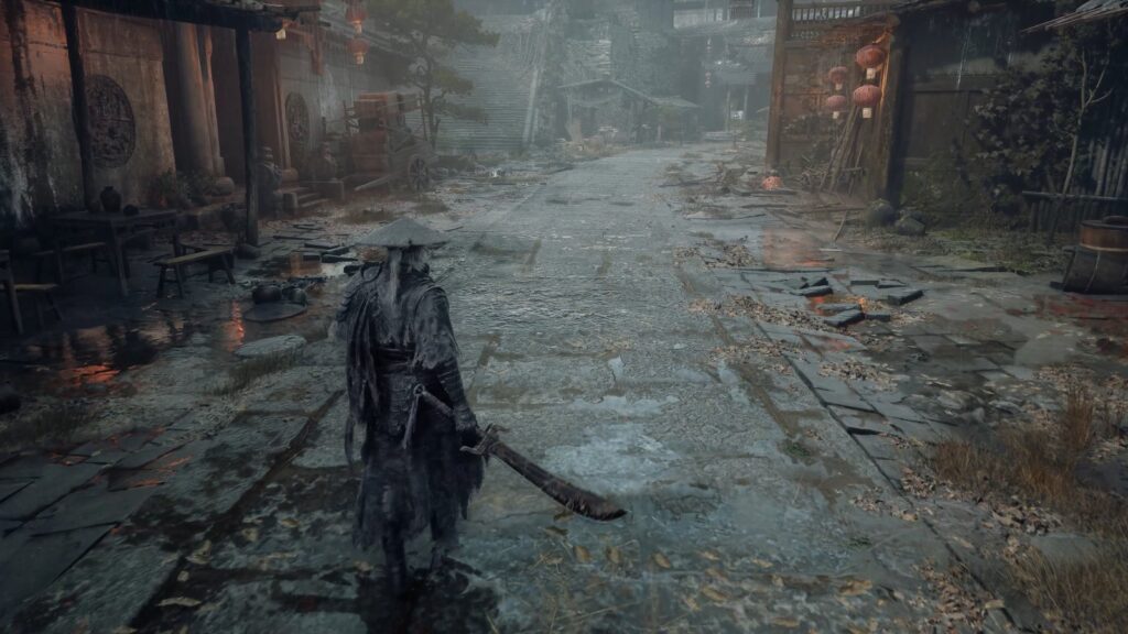 A straw-hatted swordsman walking through a rain-soaked street lined with traditional buildings and red lanterns