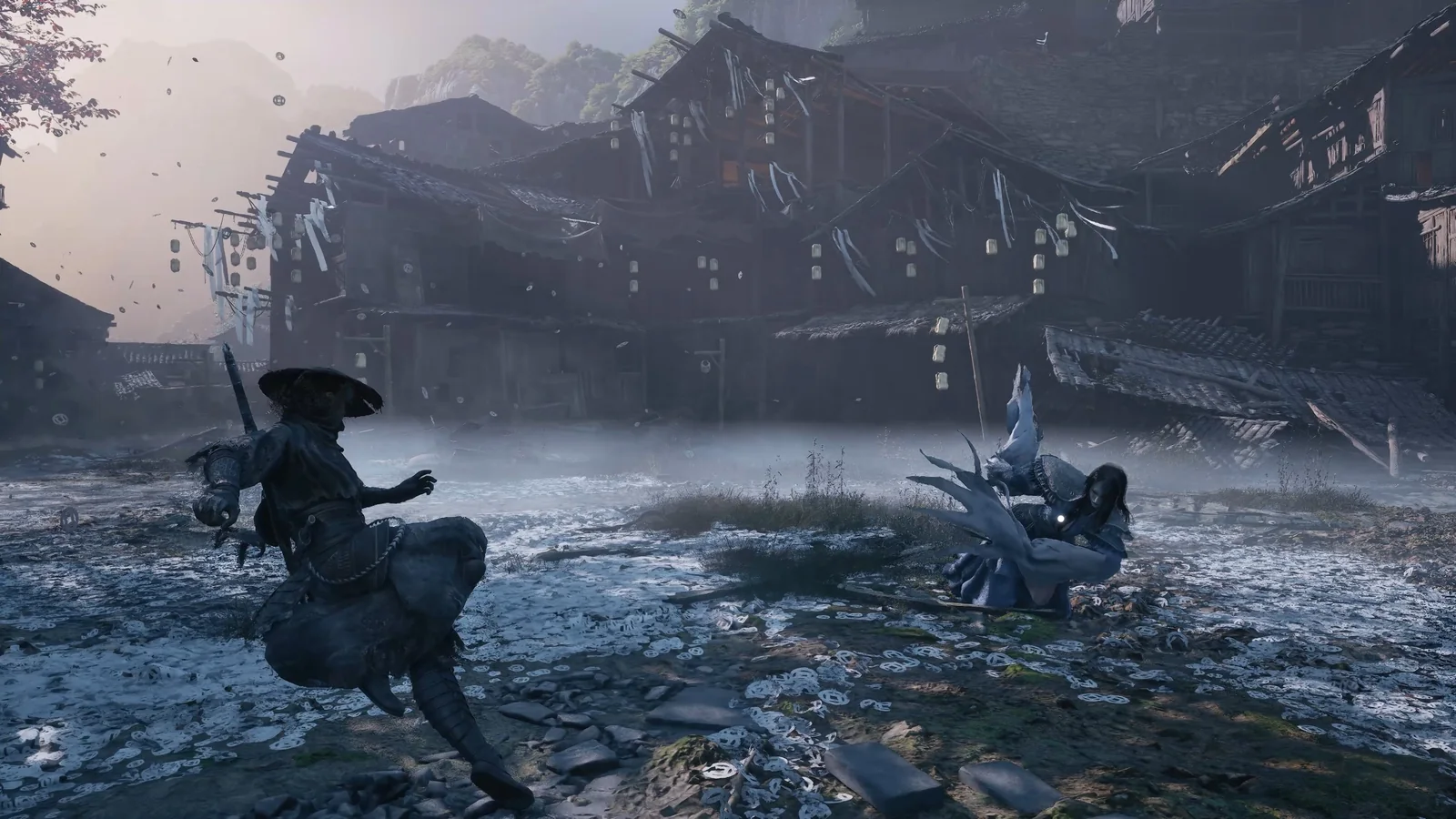 A martial artist wearing dark clothing and a wide-brimmed hat prepares for combat in a foggy, abandoned village