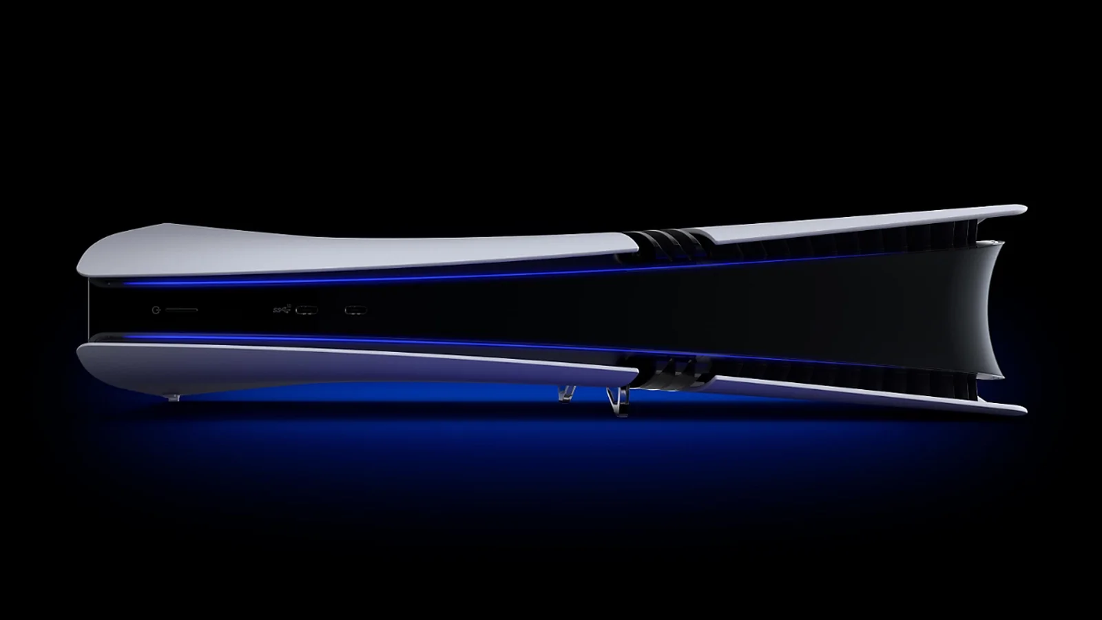 Close-up of a horizontally positioned PlayStation 5 Pro with blue lighting illuminating its black-and-white chassis