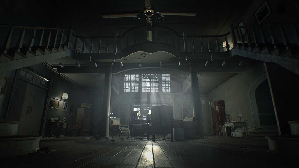Resident Evil 7 Nearly Featured Leon, Jill and Hunk Official Resident Evil 7 screenshot showing the dark, abandoned main hall of the Baker family mansion, with sunlight