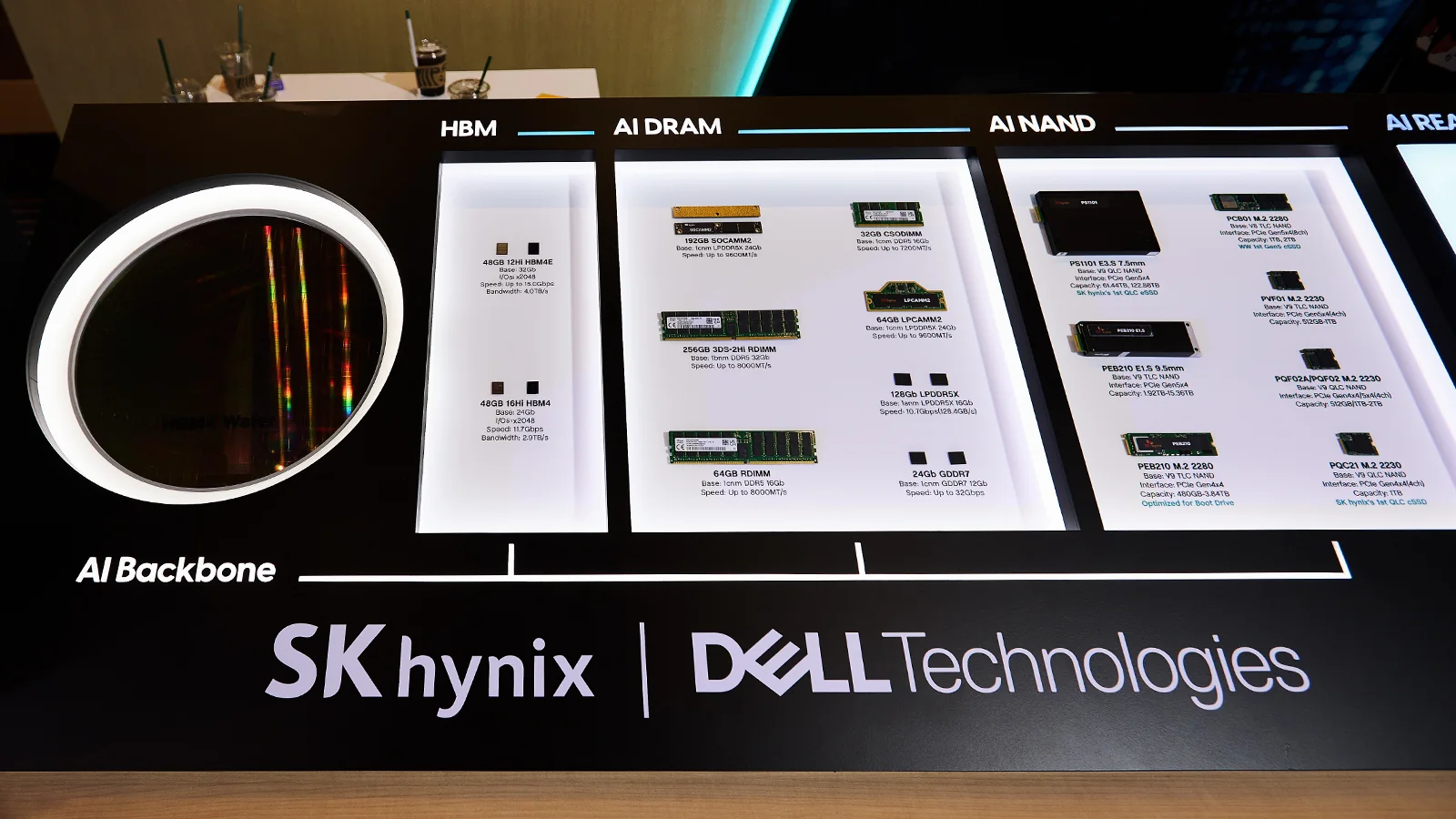 SK hynix HBM and DRAM product lineup alongside a semiconductor wafer at Dell Technologies Forum 2026