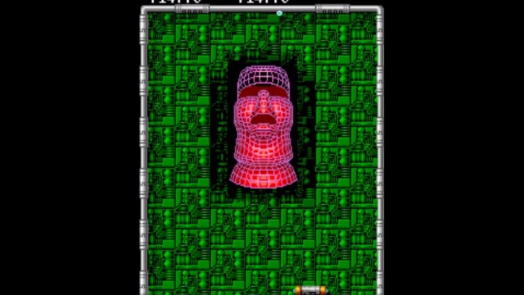 Original Arkanoid: Revenge of DOH arcade gameplay showing colorful block formations, paddle, ball, and power-ups