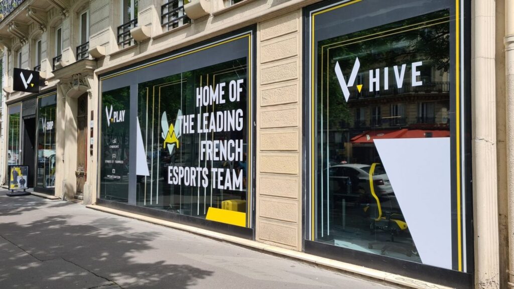 Team Vitality’s Paris HQ Looted, Trophies and PCs Stolen Exterior of Team Vitality's V.Hive headquarters in Paris, showing the large V.Hive branding on its glass storefront