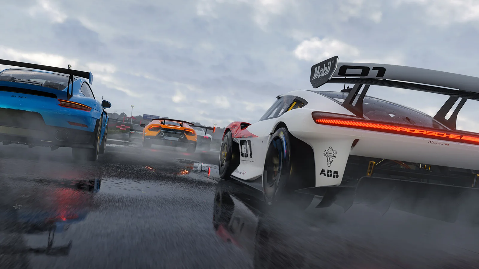 Forza Motorsport screenshot showing a dark Pagani hypercar racing alongside an orange supercar