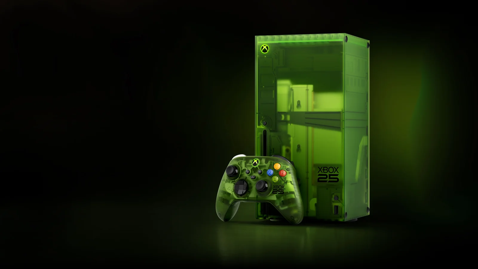 Xbox Series X25 limited-edition translucent green console displayed with its matching anniversary controller against a